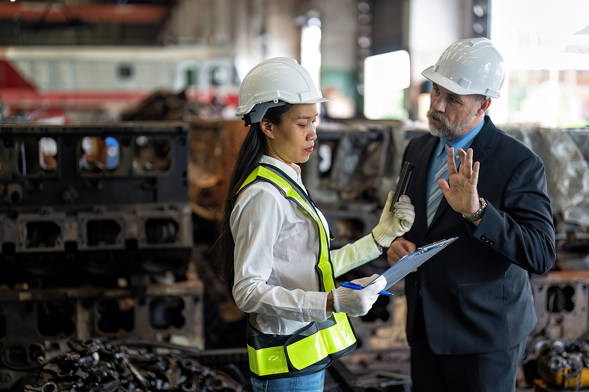 Maintenance manager meet engineer checking spare part ready for overhaul repair engine machine